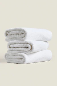 (500 GXM²) SERVIETTE DE BAIN COTON ÉPONGE UNIE