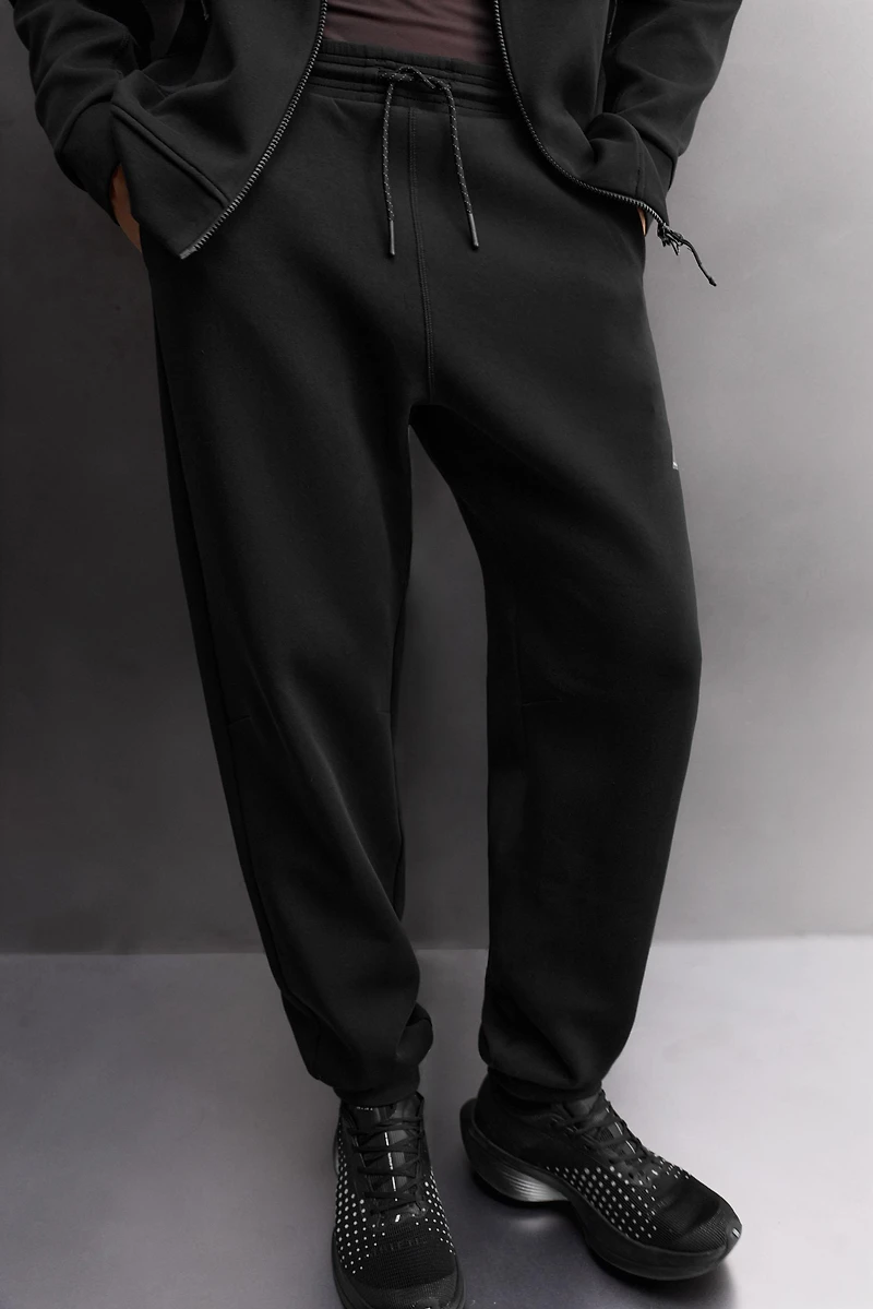 TECHNICAL ZIP PANTS
