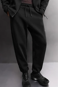 TECHNICAL ZIP PANTS