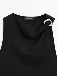 Draped neckline top with brooch detail