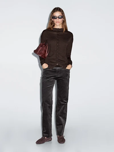 Mock turtleneck cardigan with covered buttons