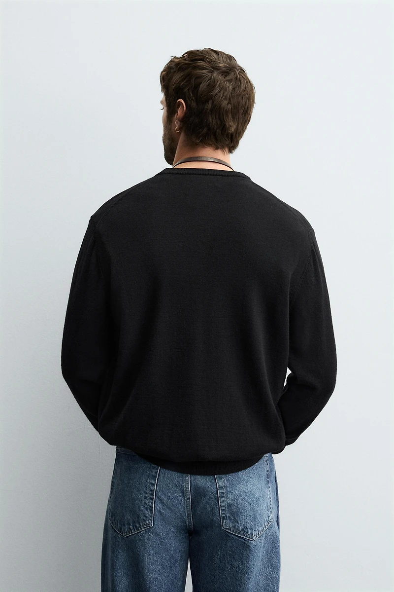 100% WOOL SWEATER