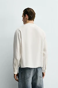 FLOWY V-NECK SHIRT