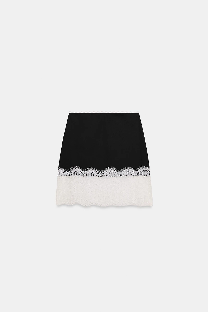 MINI-JUPE BIMATIÈRE EN DENTELLE