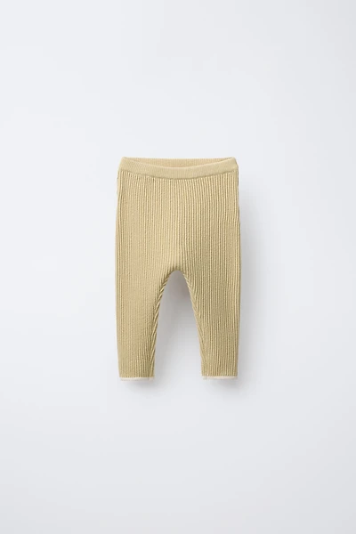 PANTS WITH CONTRASTING PIPING