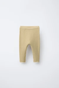 PANTS WITH CONTRASTING PIPING