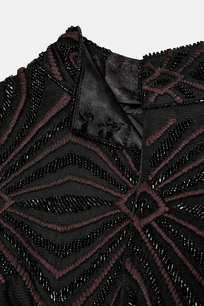 TOP EN TULLE À FRANGES ET FANTAISIE