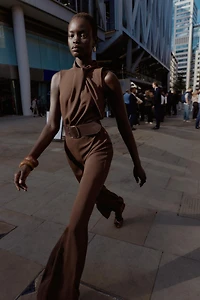 SLEEVELESS BELTED JUMPSUIT