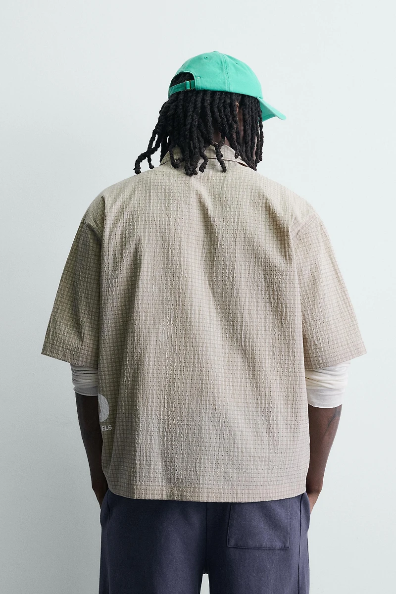PLAID SHIRT WITH PRINTED TEXT