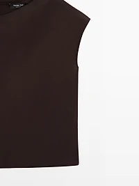 Top asymétrique broche