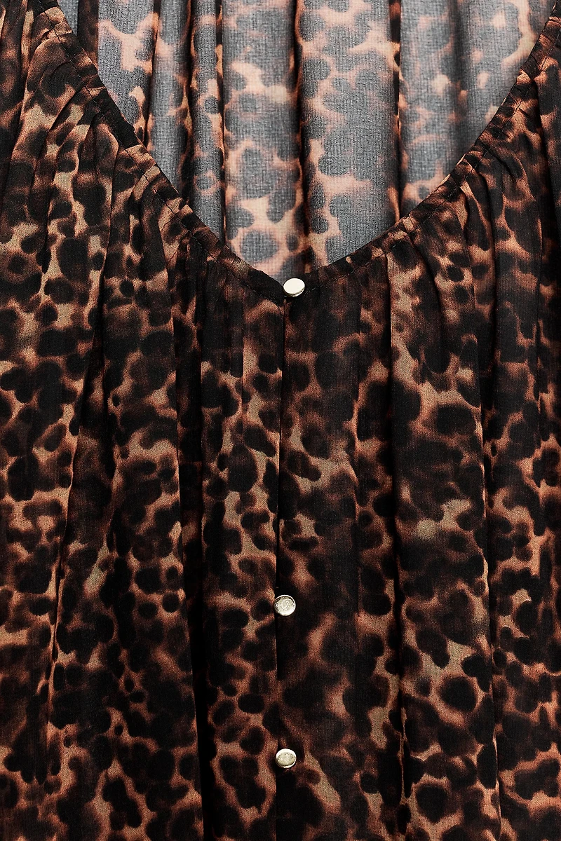 BLOUSE SEMI-TRANSPARENTE À IMPRIMÉ ANIMALIER