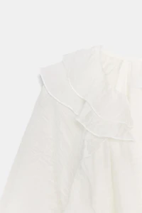 BLOUSE À VOLANTS ET PLIS