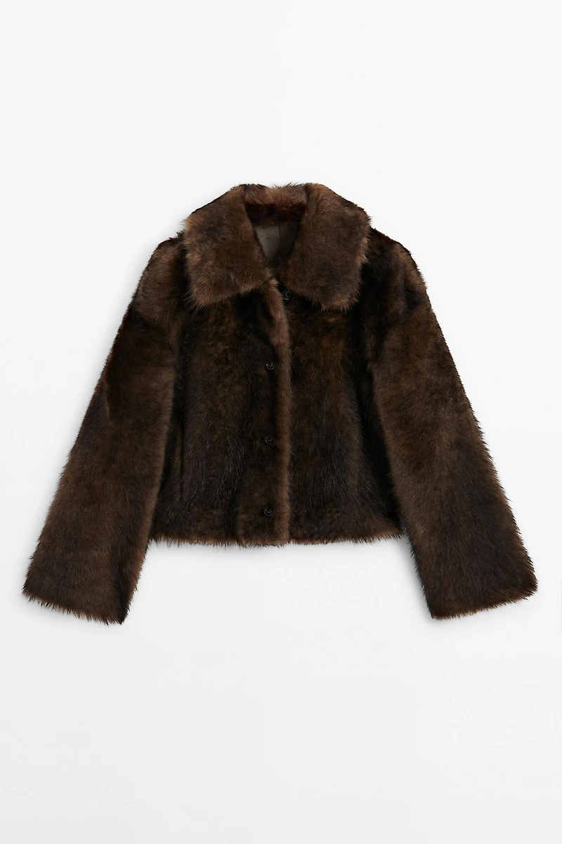 Manteau court en peau