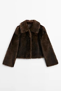 Manteau court en peau