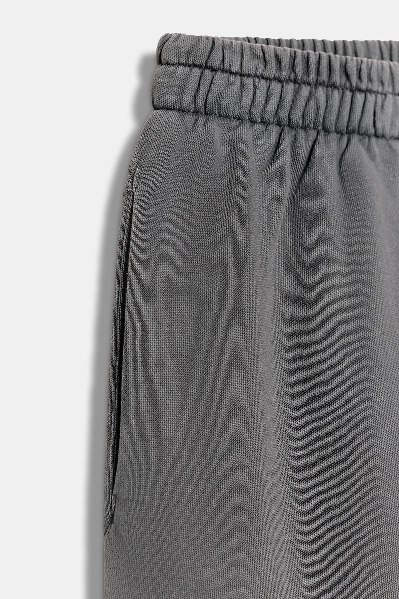 WASHED EFFECT WIDE LEG PANTS