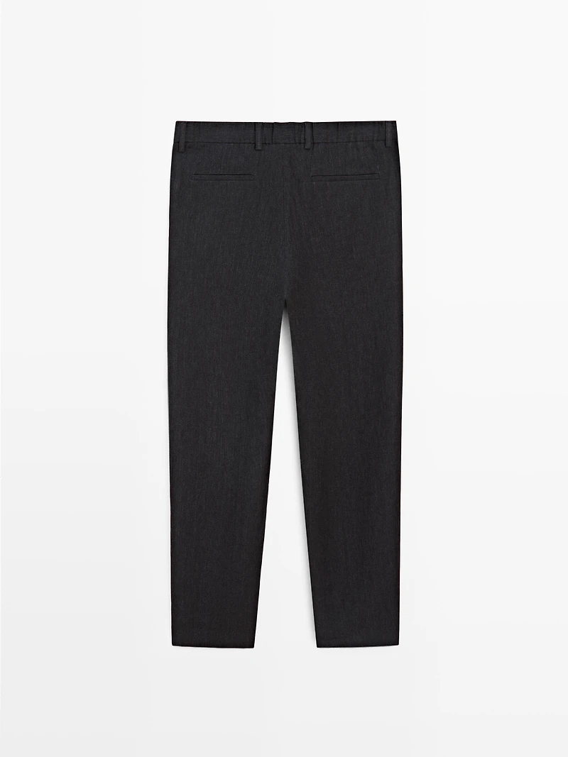 Total look linen trousers with flecked detail