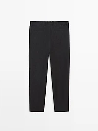 Total look linen trousers with flecked detail