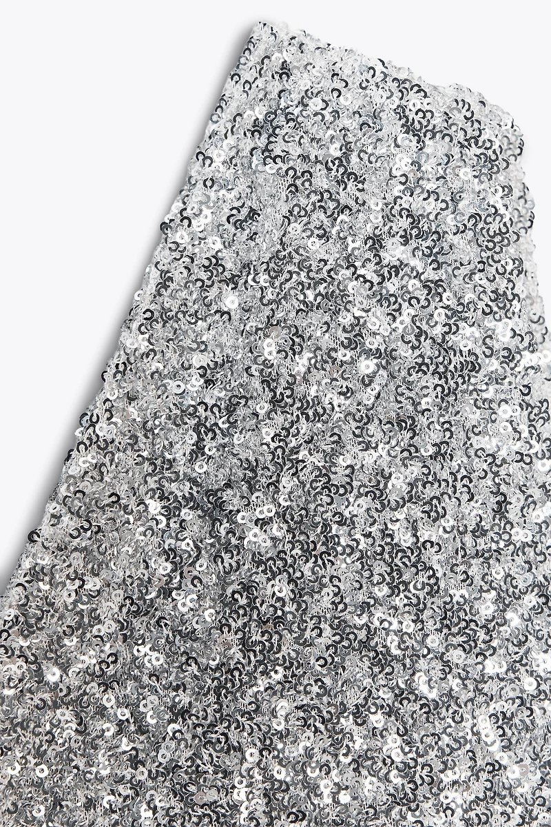 ASYMMETRIC SEQUIN TOP