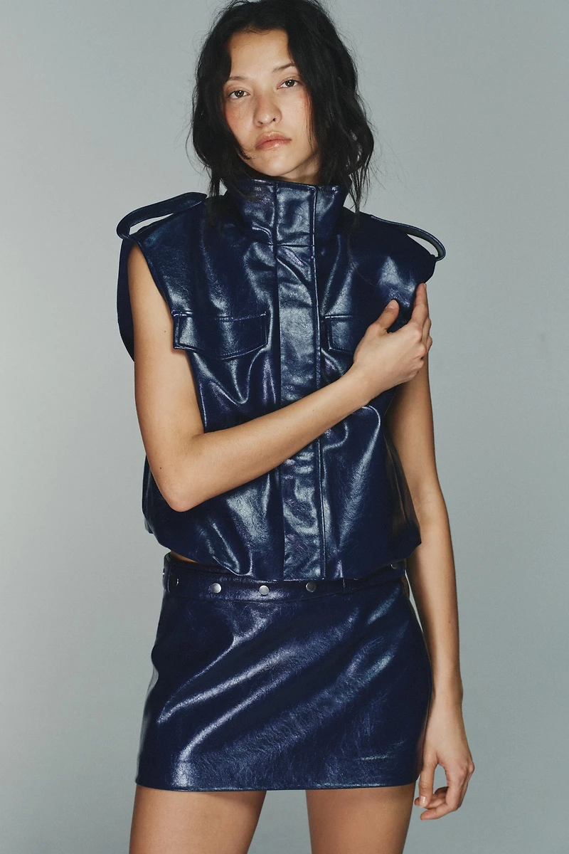 FAUX LEATHER STUDDED MINI SKIRT