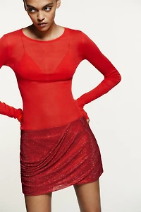 MINI JUPE DRAPÉE STRASS