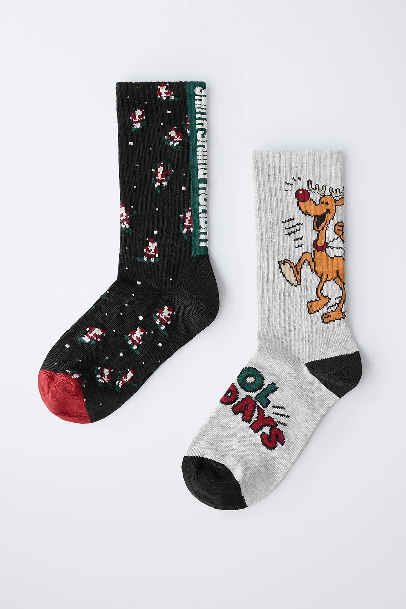 TWO-PACK OF SANTA CLAUS AND REINDEER LONG SOCKS