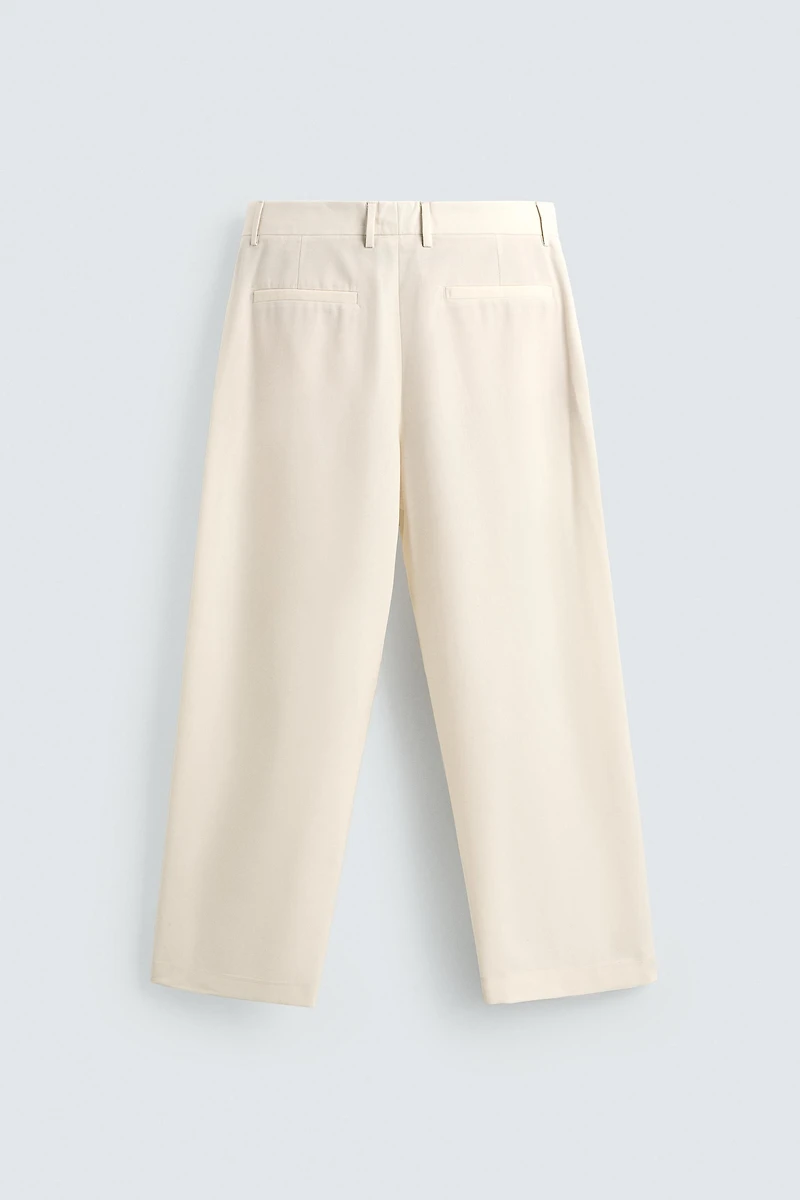 WOOL PLEATED PANTS