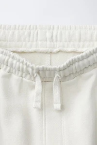 PANTALON DE JOGGING LARGE EN MOLLETON