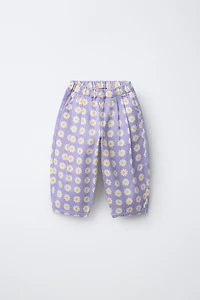 PANTALON EN SERGÉ BALLON À FLEURS