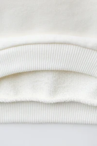 FLOCKED PRINT SWEATSHIRT