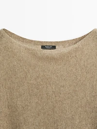 100% wool asymmetric knit cape
