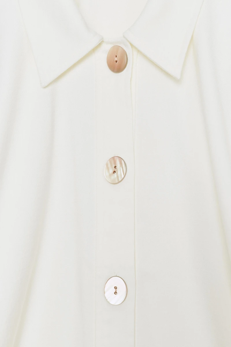 CHEMISE SANS MANCHES AMPLE