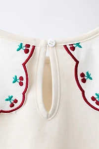EMBROIDERED CONTRAST COLLAR TOP