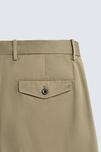 PANTALON COUPE LARGE À PLIS
