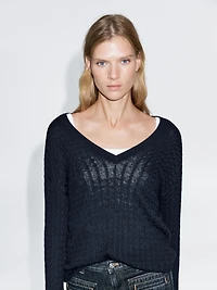 Pull en maille tressée à col V