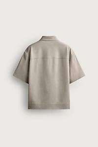 TECHNICAL ZIP POLO SHIRT
