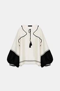 VOLUMINOUS RUFFLE BLOUSE