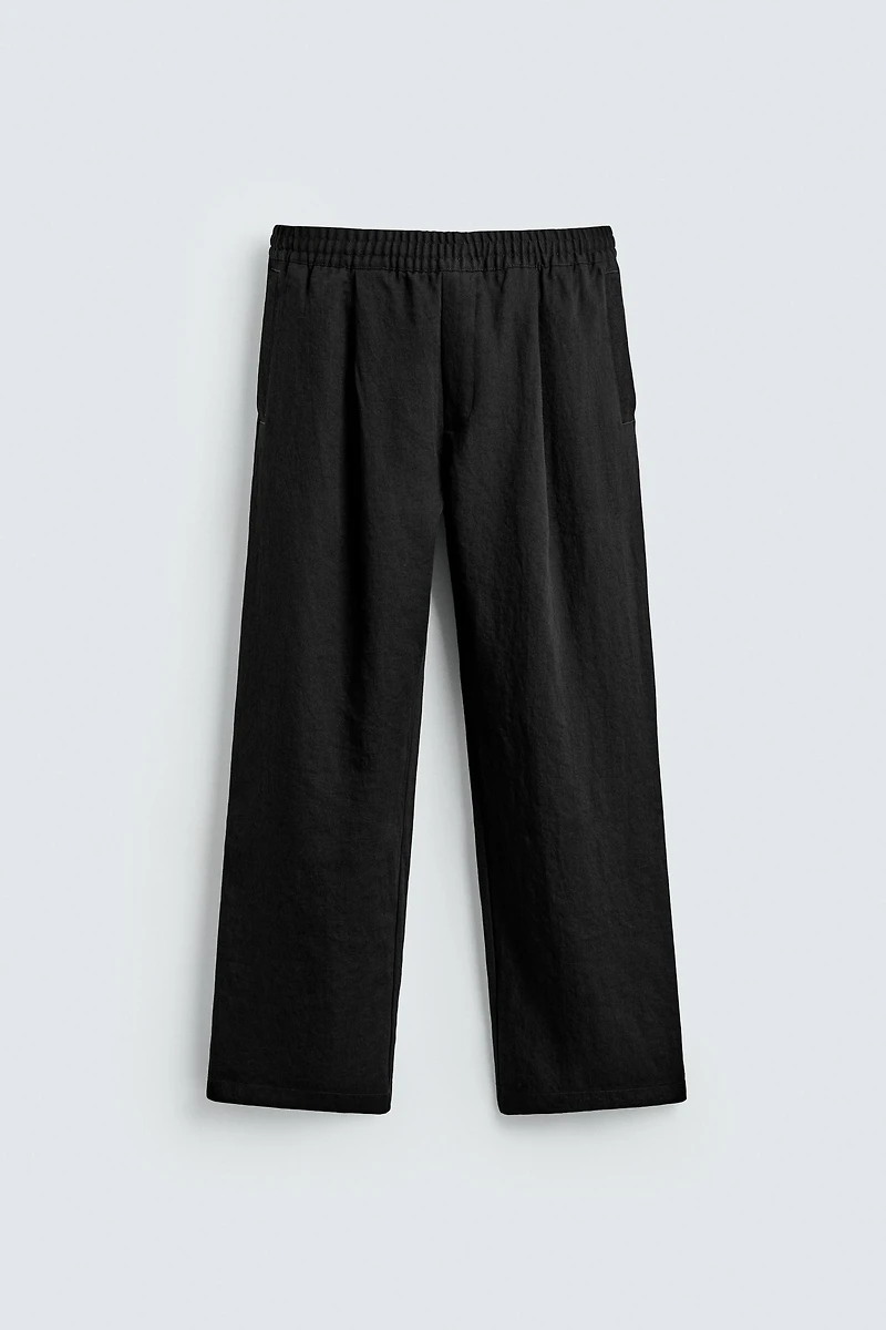 FLOWY PLEATED PANTS