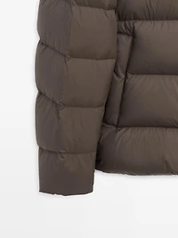 Water-repellent hooded puffer jacket