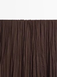 Long flowing pleated skirt