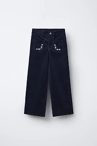 PANTALON EN VELOURS À FLEURS BRODÉES