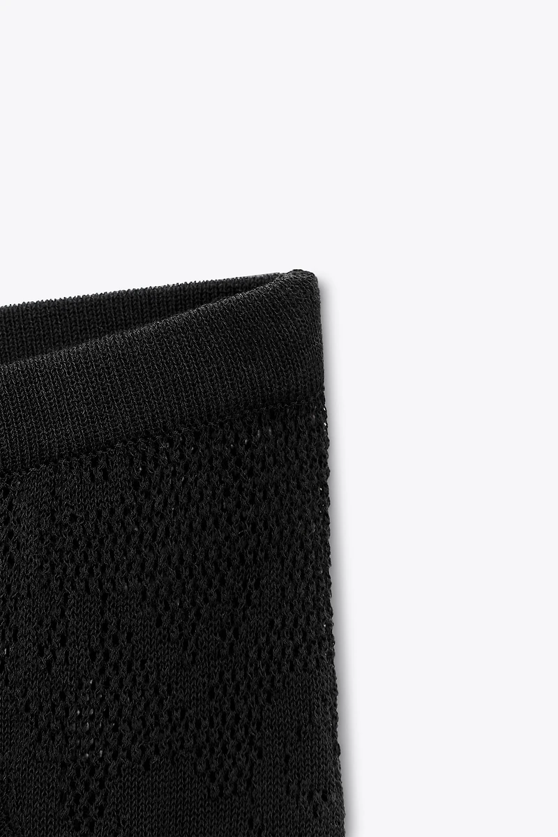 PANTALON EN MAILLE TEXTURÉE À FLEURS
