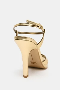 METALLIC EFFECT HEELED SANDALS