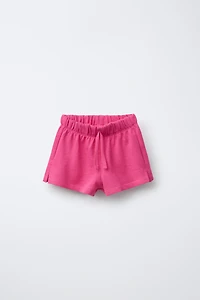 TWO-PACK OF PLAIN AND STRIPED SHORTS