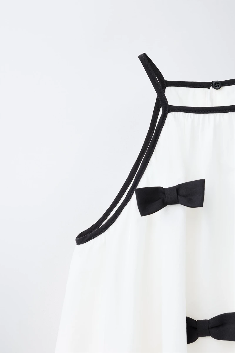 ROBE À NŒUD ET ENCOLURE HALTER