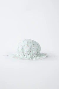 EMBROIDERED SWISS HAT WITH FLORAL PRINT