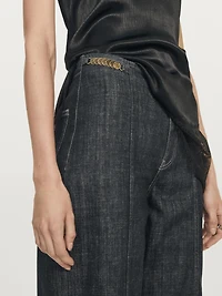 High-waist wide-leg jeans with chains