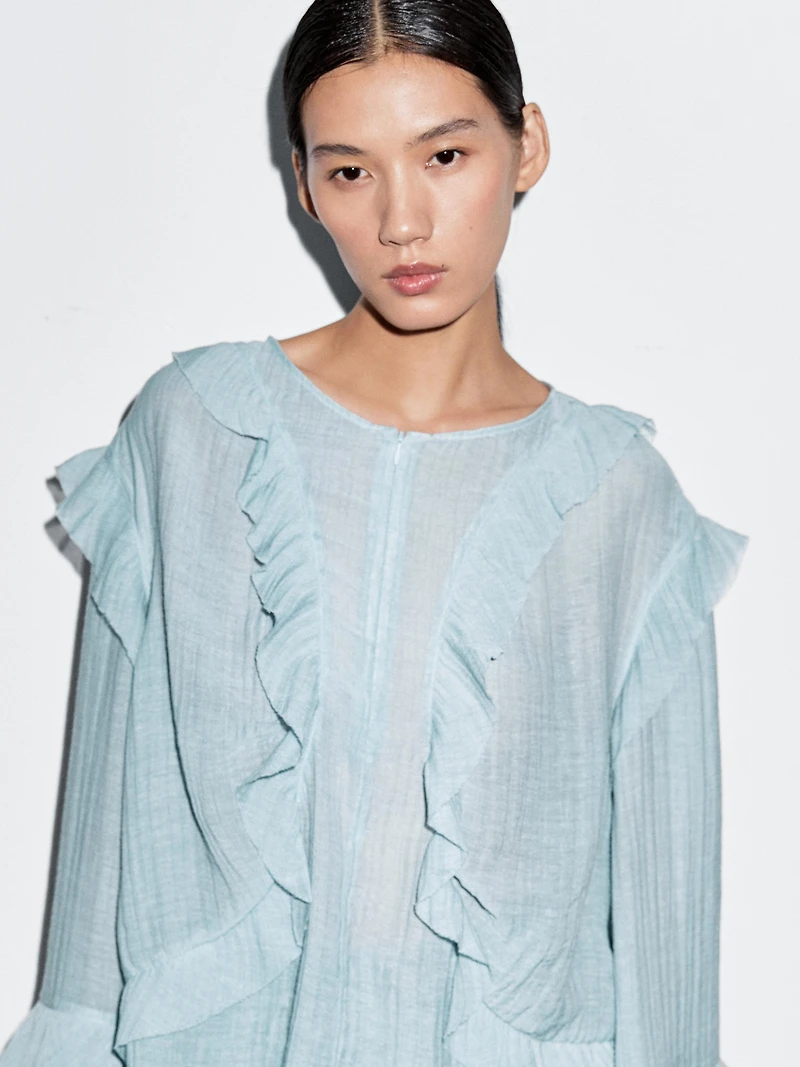 Flowing blouse with ruffles