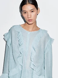 Flowing blouse with ruffles