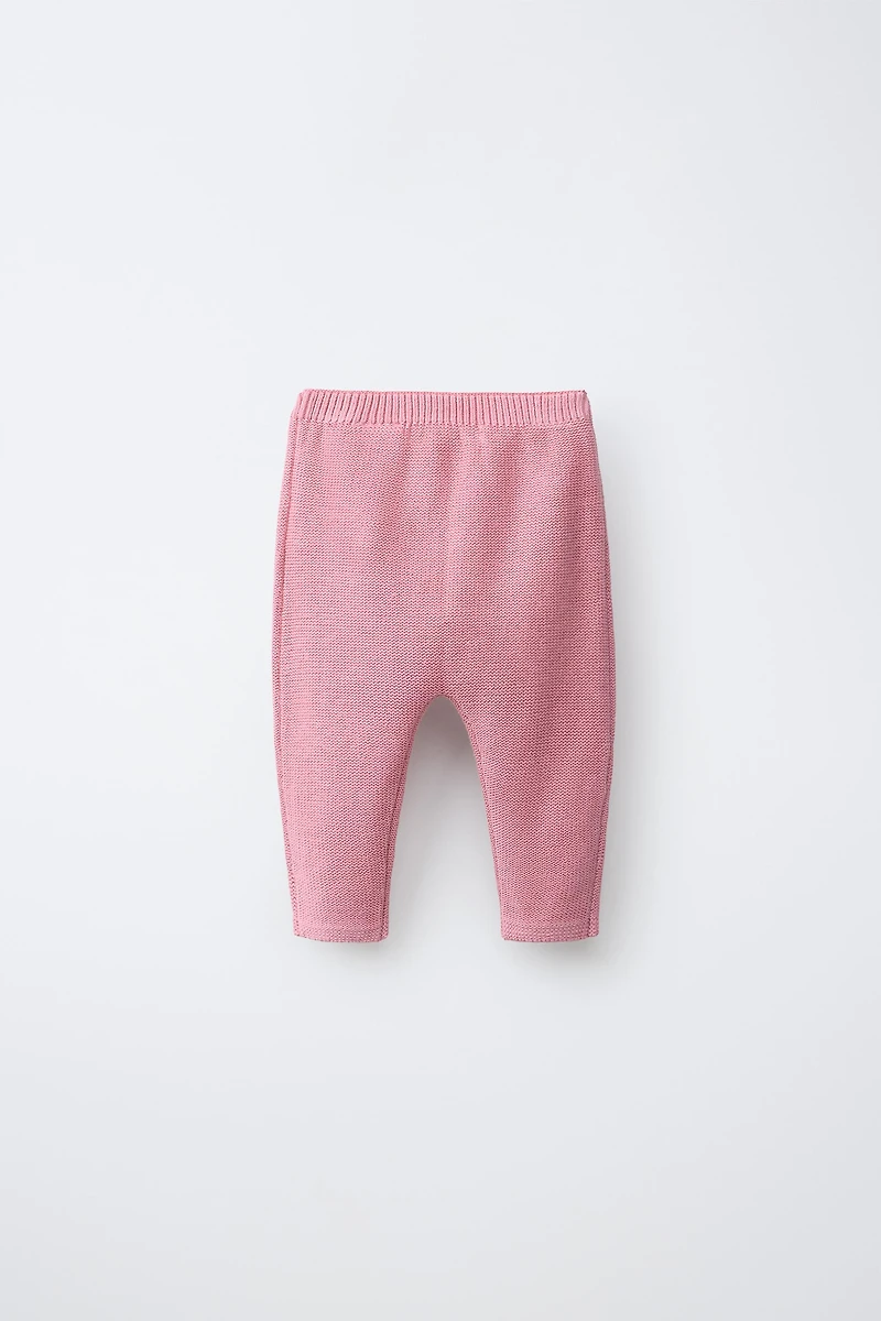 PANTALON EN MAILLE AVEC DÉCOR PAPILLON