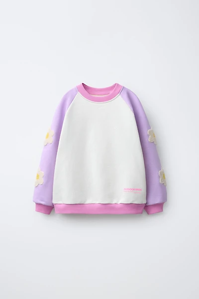 CONTRASTING SLEEVE FLORAL SWEATSHIRT